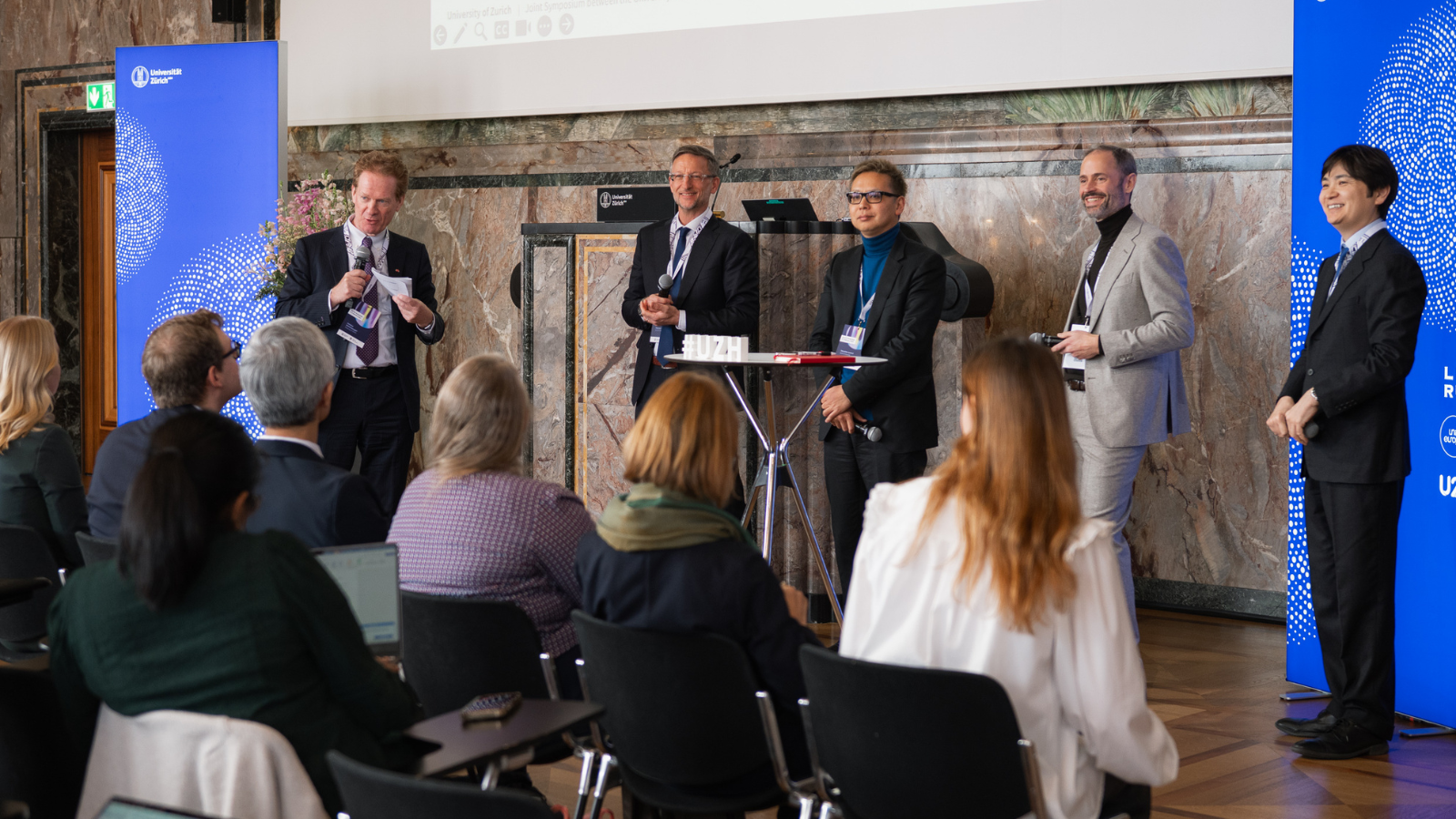 During the opening plenary on the following day, researchers presented the collaborations they have been involved in and highlighted the value of the UZH-KU partnership for their work. Pictured (from left to right): Prof. Christian Schwarzenegger, Prof. Florent Thouvenin, Prof. Tatsuhiko Inatani, Prof. Peter Picht, and Prof. Hiroki Habuka.